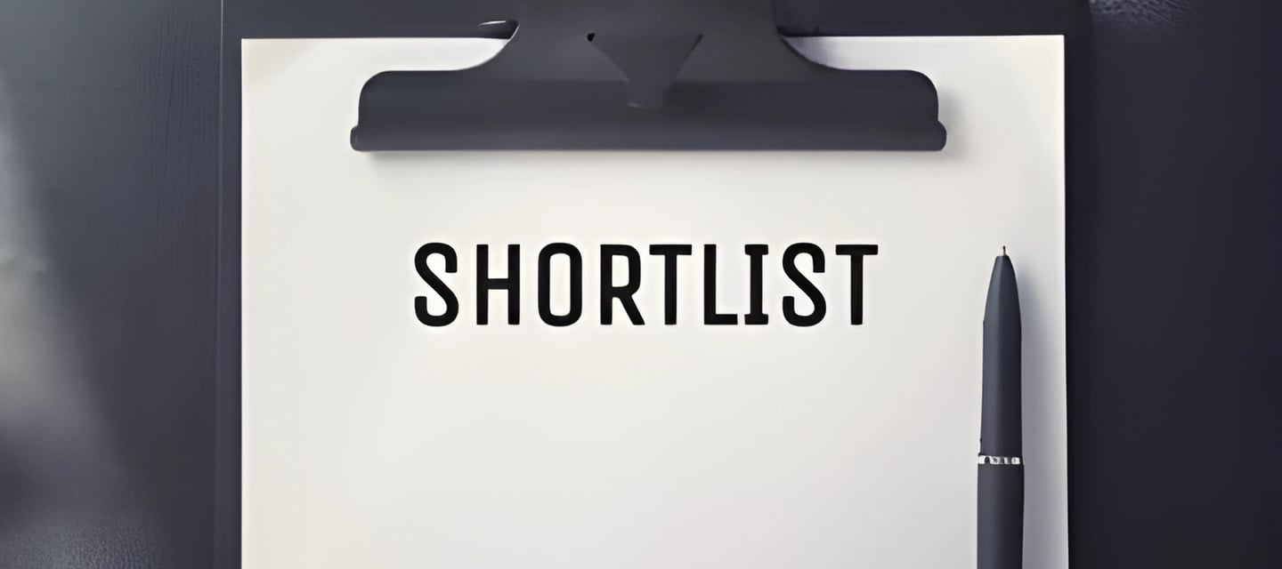Clipboard with 'SHORTLIST' bold text, symbolizing university shortlisting service for studyingabroad