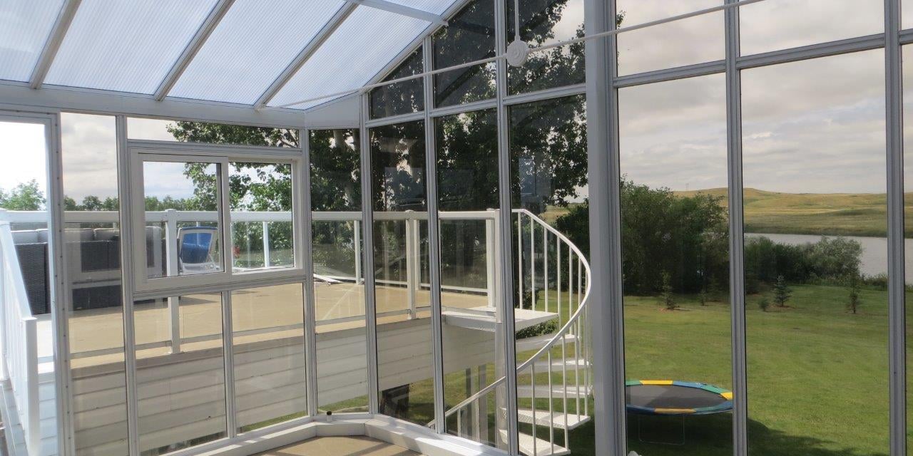 Gable Solarium with acrylic walls and polycarbonate roof.