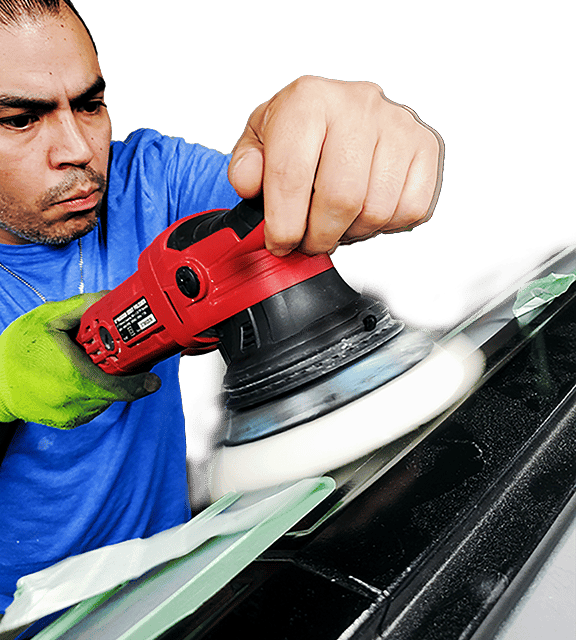 Paint correcting a side car panel in Alamo Heights