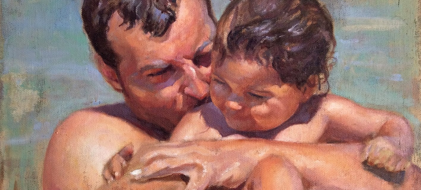 a man and a child in a pool