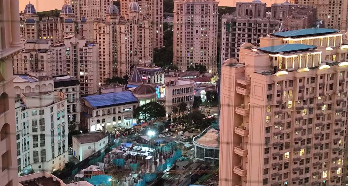 a cityscape of a city with a clock tower