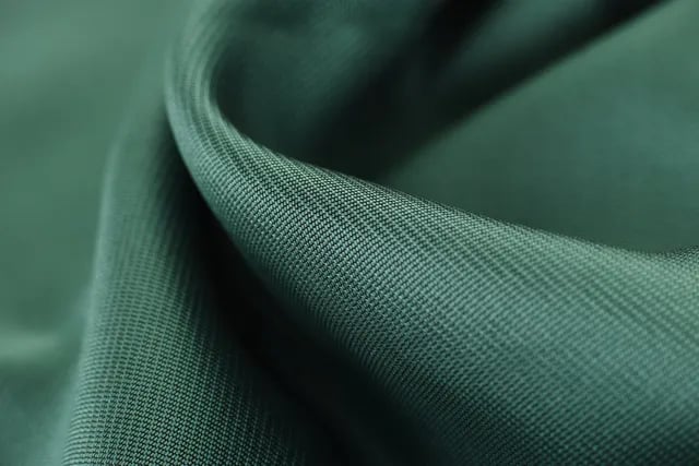 Green fabric depicting upholstery