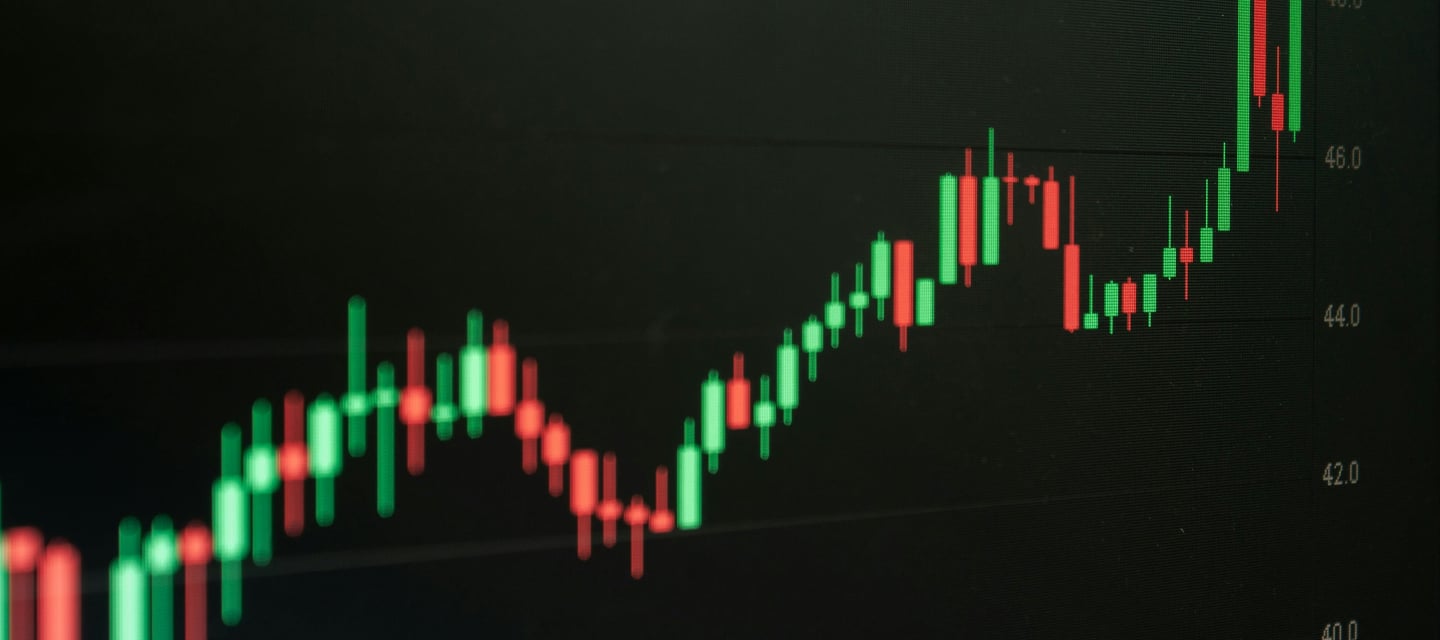 Stylized cryptocurrency candlestick chart trending upward, representing investment growth and DeFi i