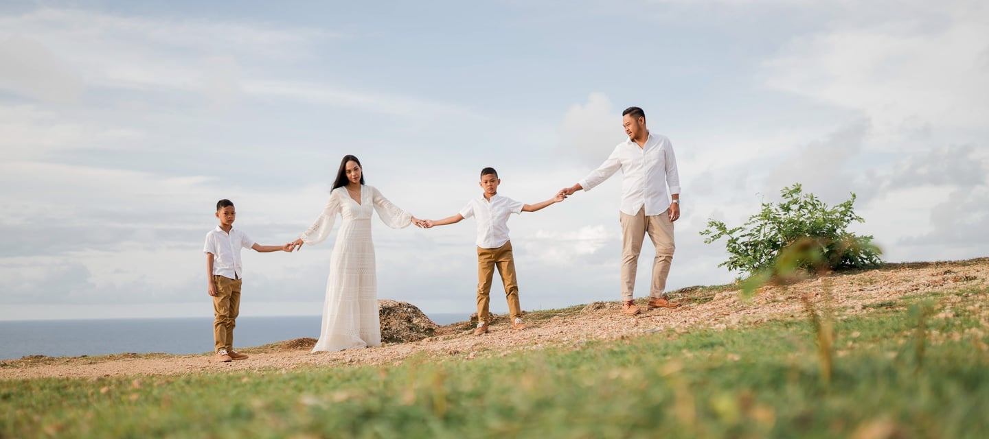 Timeless family photography moment of Ayunda family at Melasti Beach Bali.