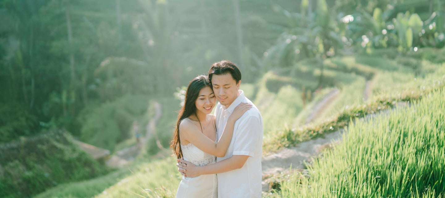 Intimate couple embrace during a sunrise photography session at Tegalalang Ubud Bali.