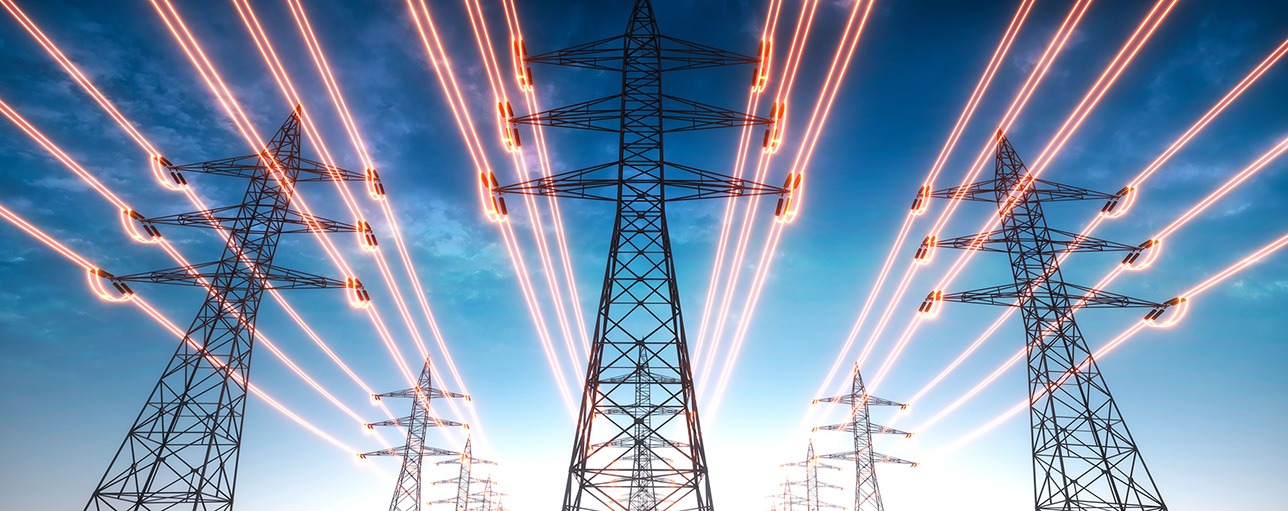 a group of power lines with a sky background