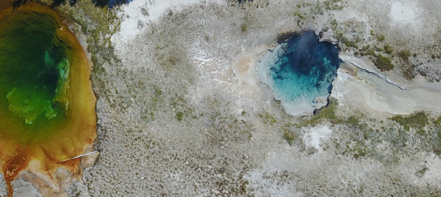 a large geothermal blue pools in yellowstone national park