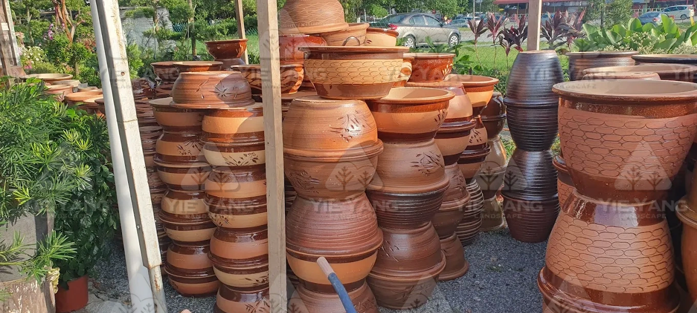 Stacked terracotta ceramic garden pots at nursery – Yie Yang Landscape