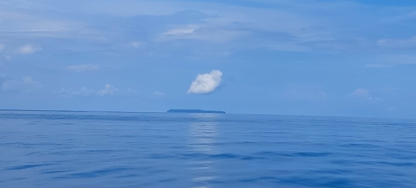 Cano Island seen from distance in a tour with Coral Expeditions Costa Rica 