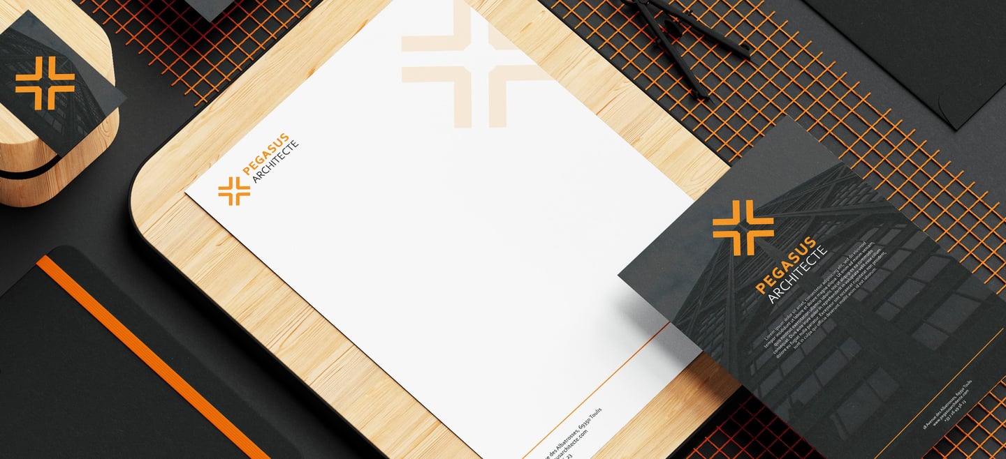 Mise en situation d'un logo sur différents éléments de papeterie