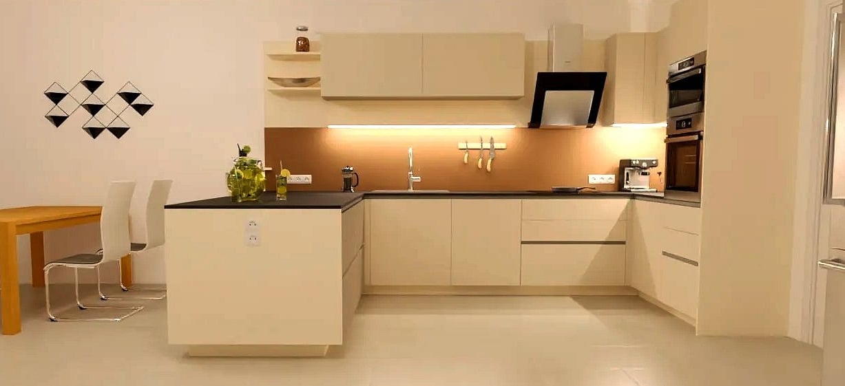 a kitchen with a table and chairs and a table