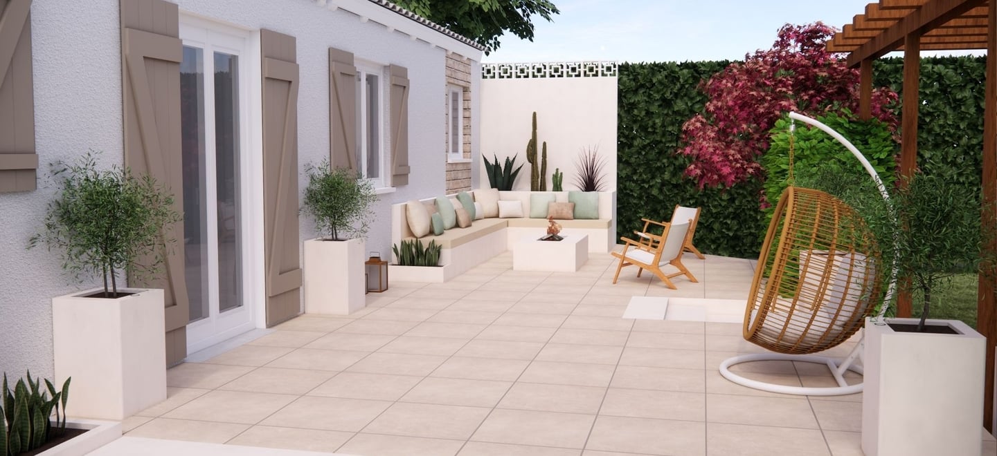 Aménagement et décoration d'une terrasse sur plot avec canapé d'angle jardinière en béton cellulaire