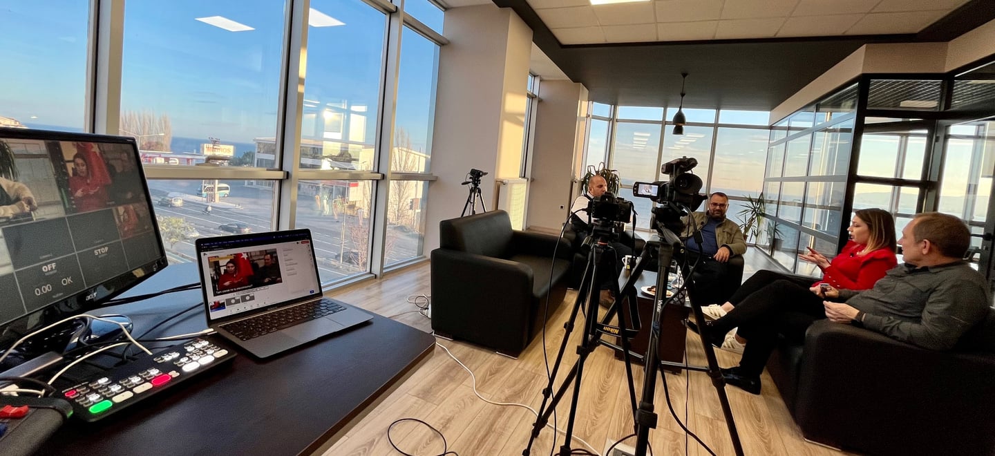 Corporate podcast production setup with multi-camera video podcast recording workflow