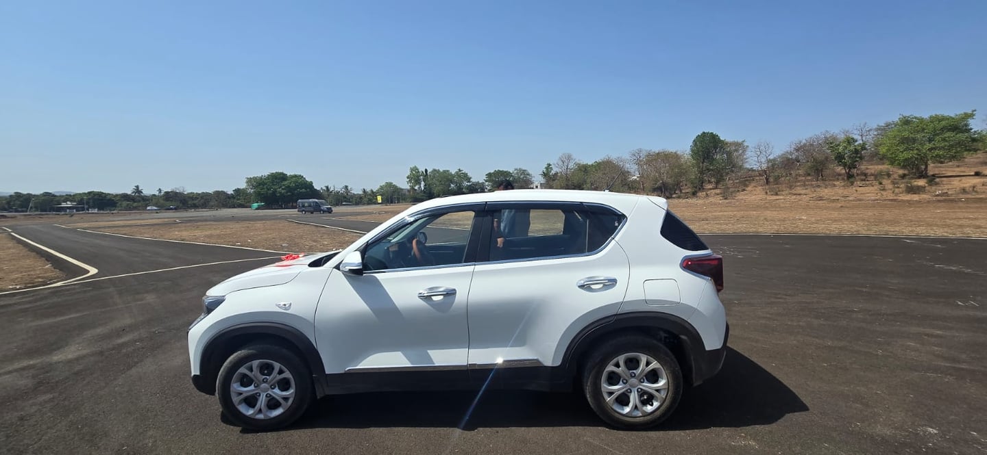 Kia Sonet taxi side view for Gir Gujarat car rental service