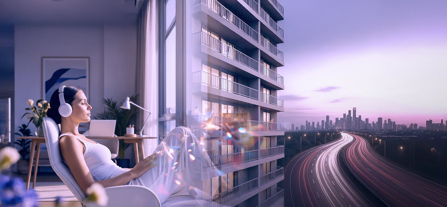 a woman sitting on a chair with headphones on