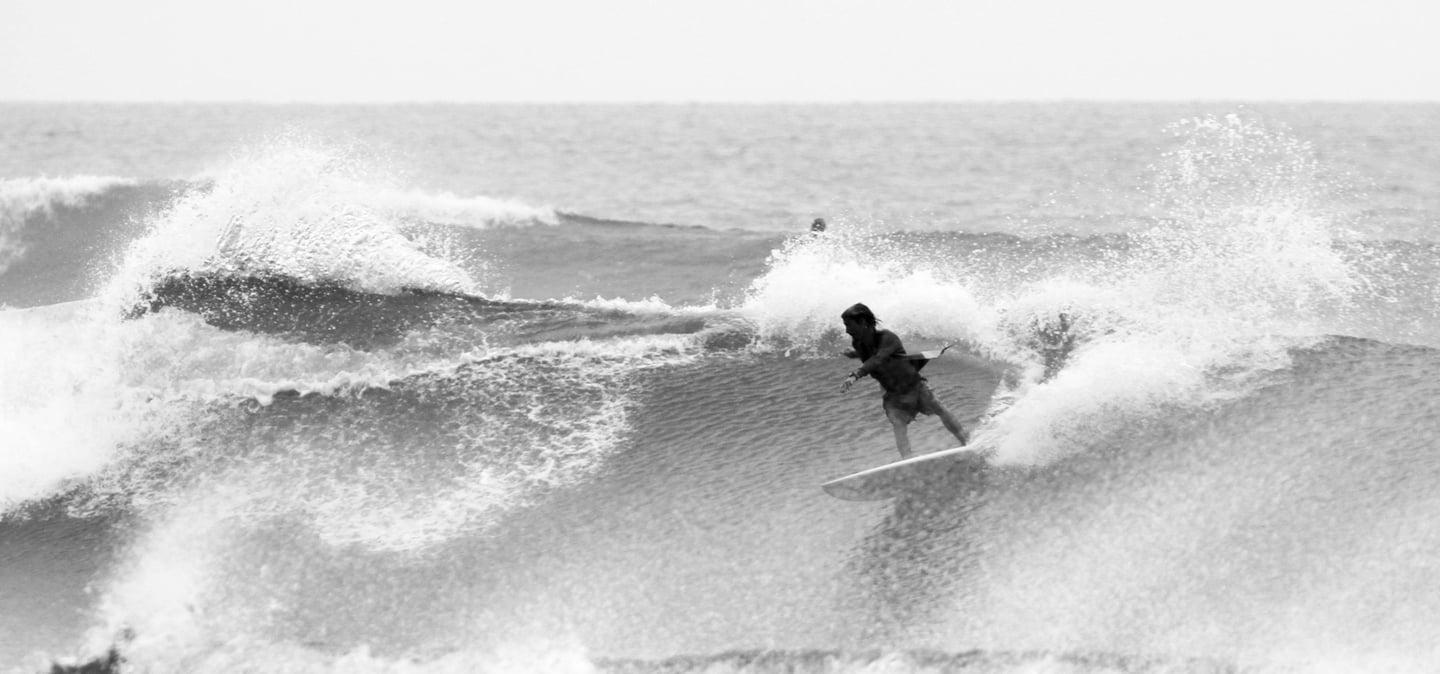 Surfer riding a wave