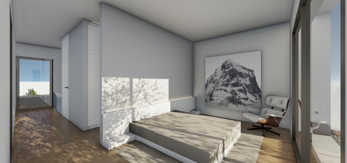 a bedroom with a bed and a chair