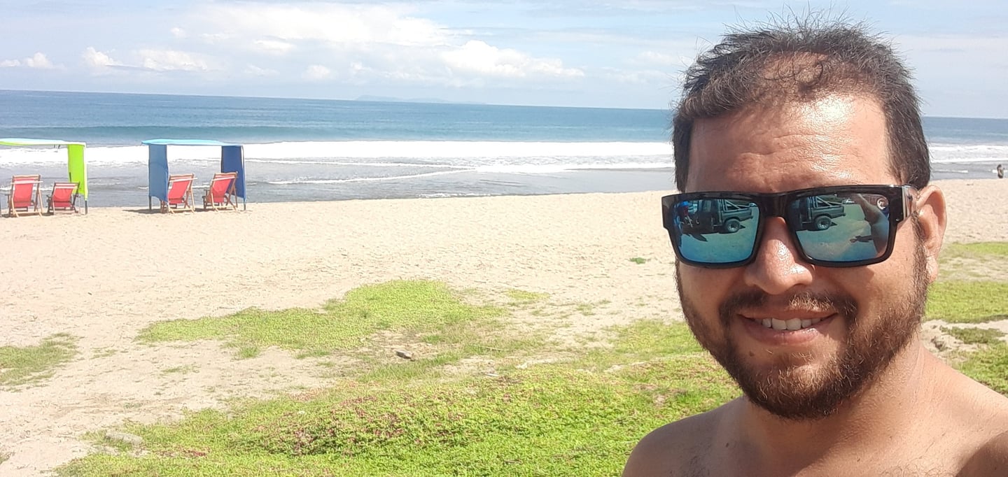 Jose Moreira surf guide on the beach