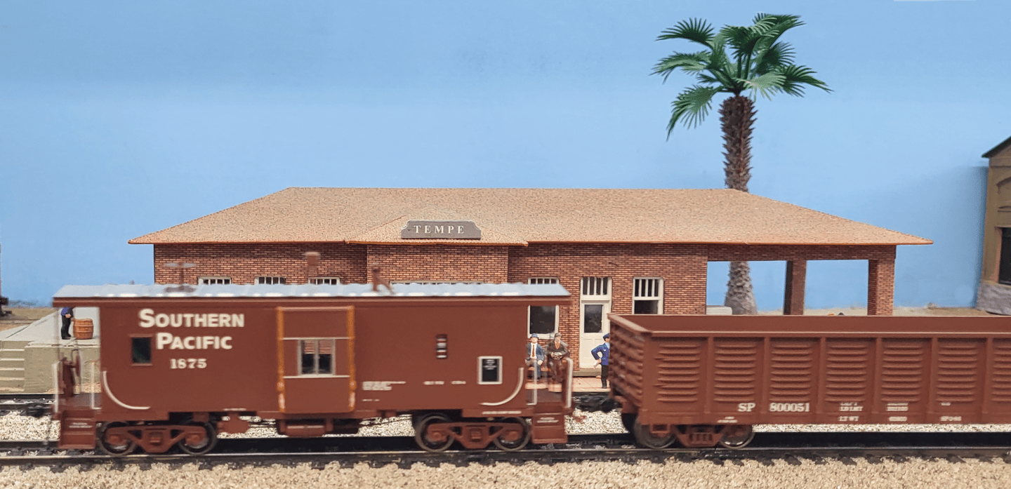 Southern Pacific Caboose stopped at Tempe station