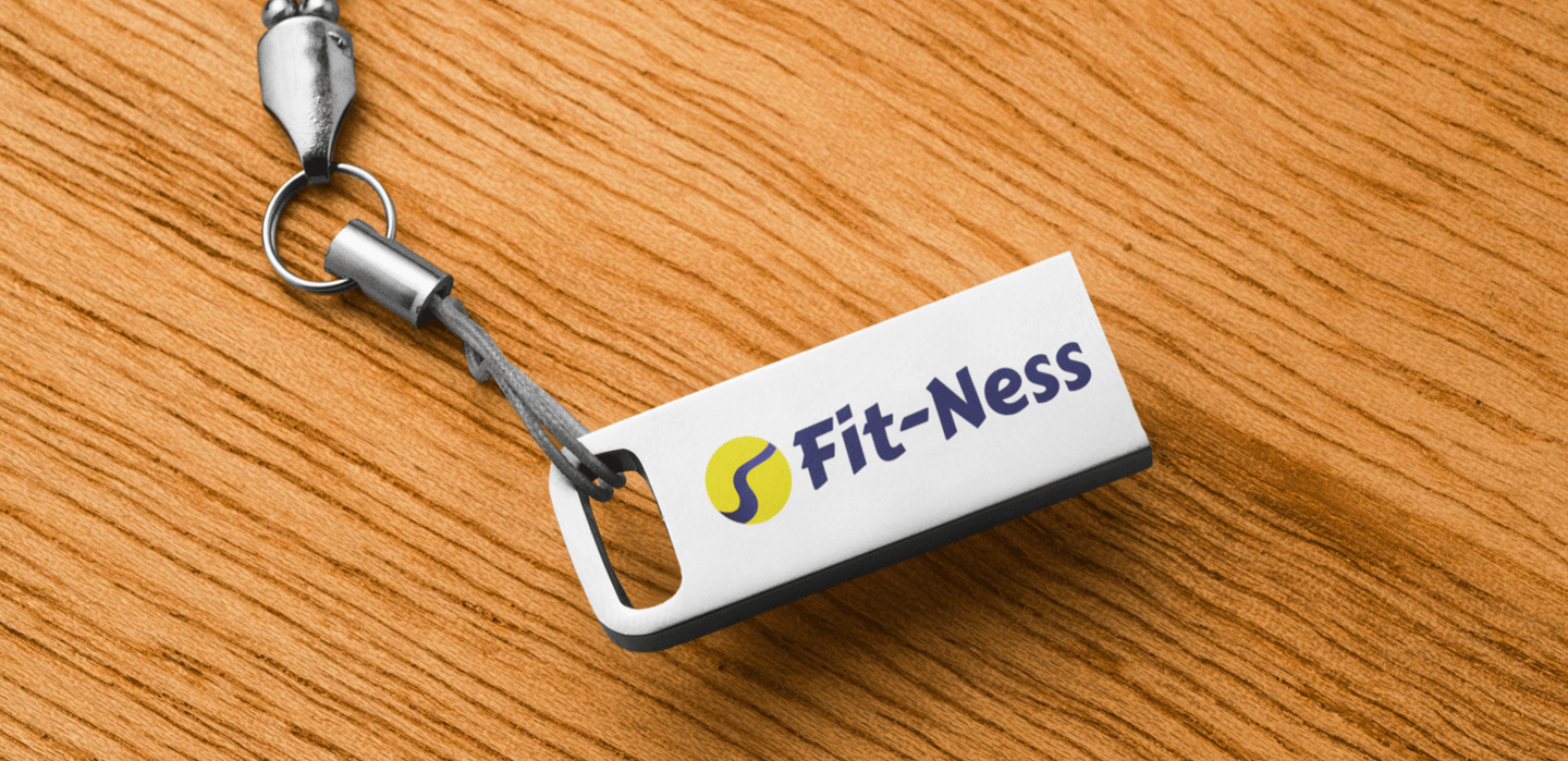 Guide de style de marque montrant une clé USB personnalisée avec logo d'un coach fitness.