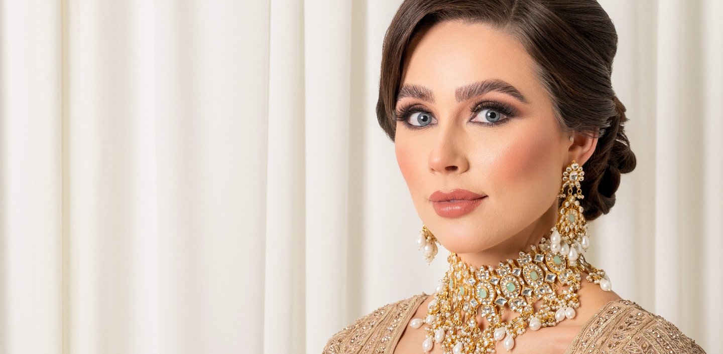asian bride in traditional gold wedding dress, timeless and elegant