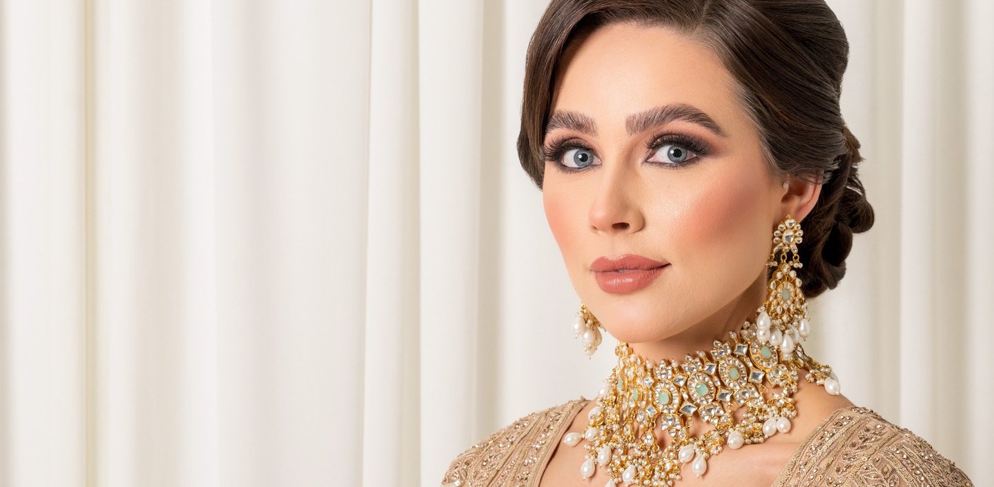 asian bride in traditional gold wedding dress, timeless and elegant