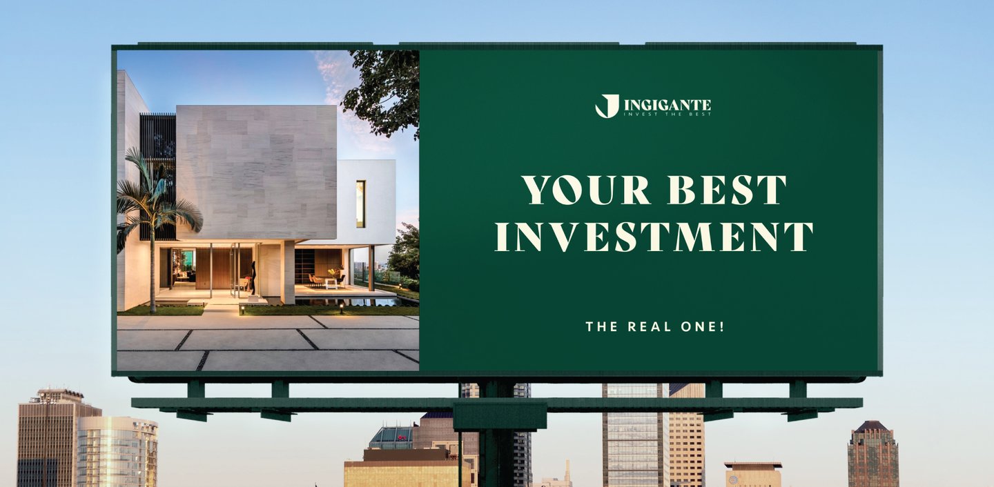a billboard board advertising a real estate in the city