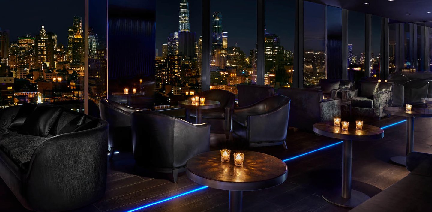 The Roof at PUBLIC Hotel – Stylish rooftop bar with NYC skyline views.