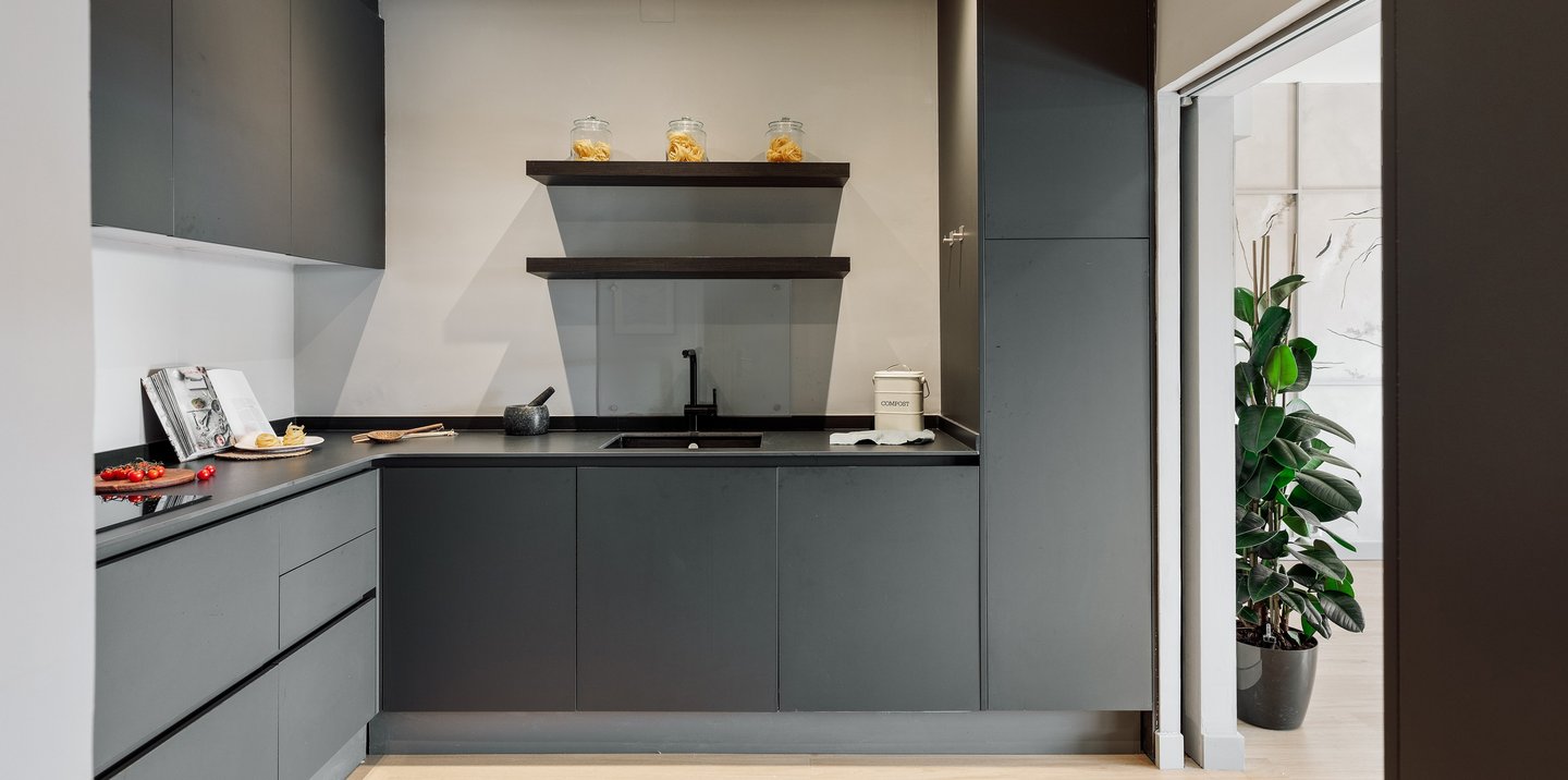 State of the art integrated dark grey kitchen design
