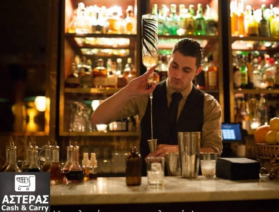 A bartender serving a drink