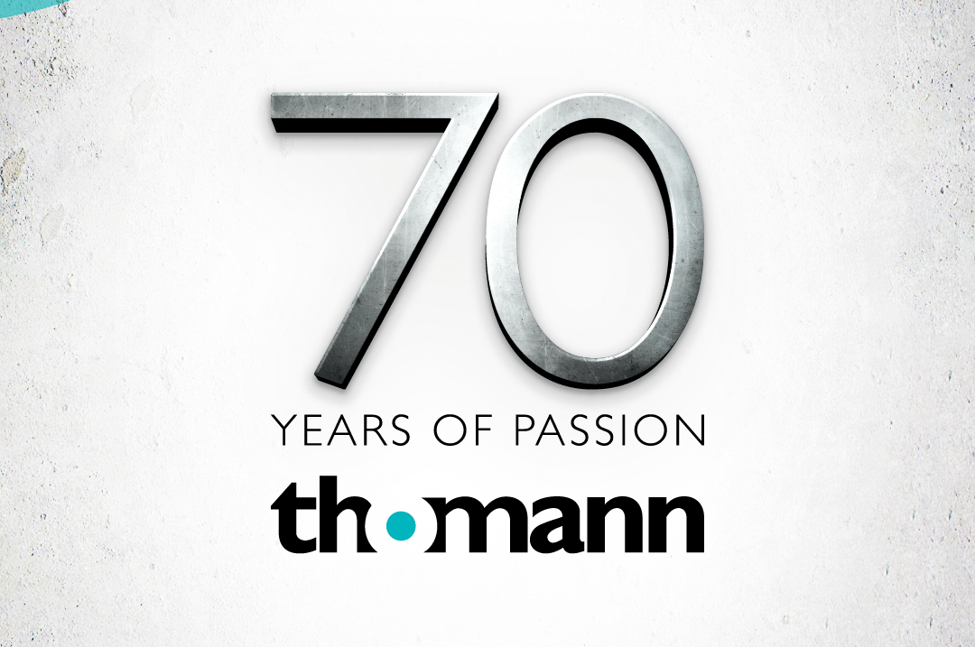 a logo of thomann 70 years of passion