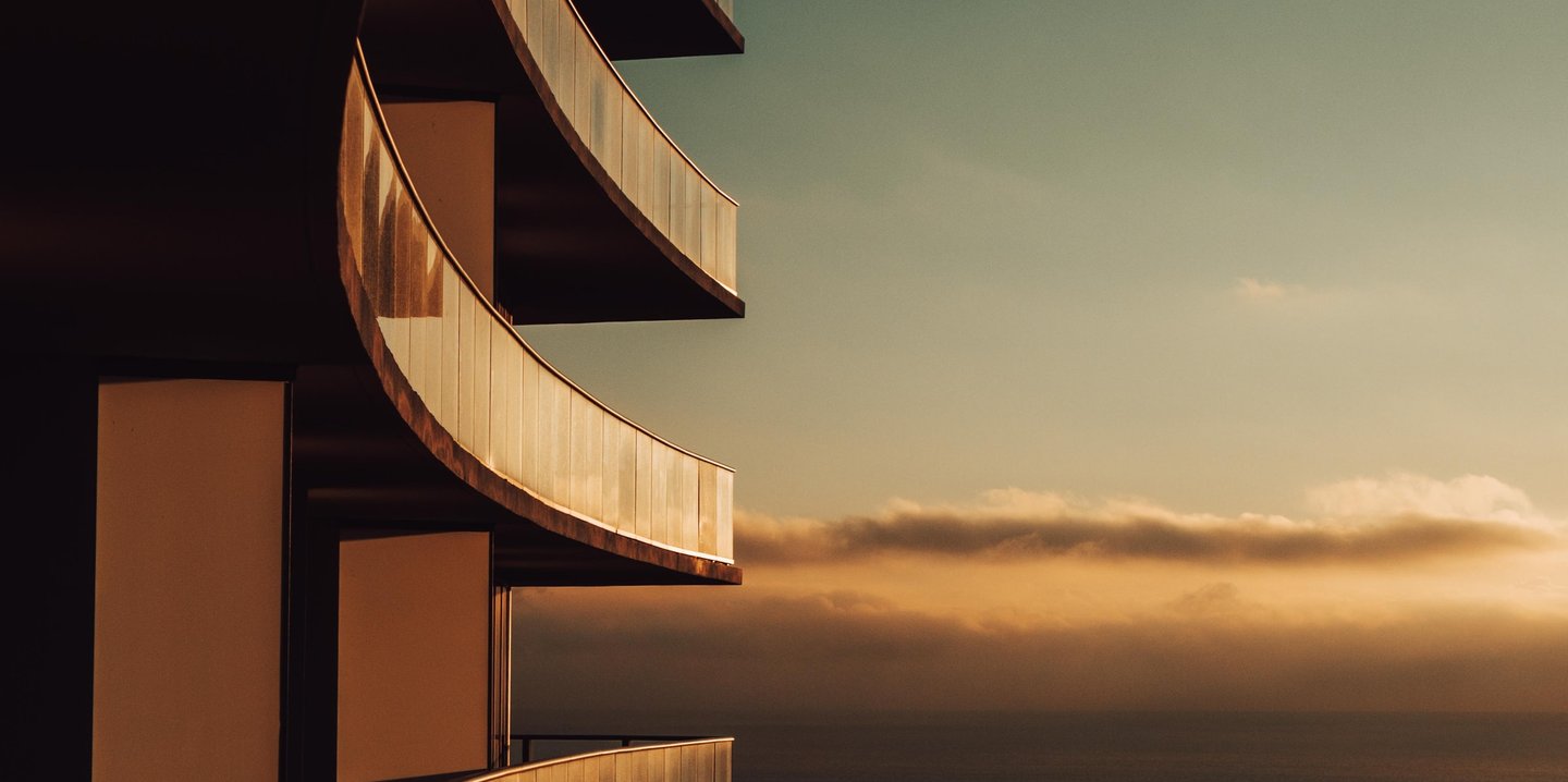 a character residential building with a view of the ocean modern and industrial style
