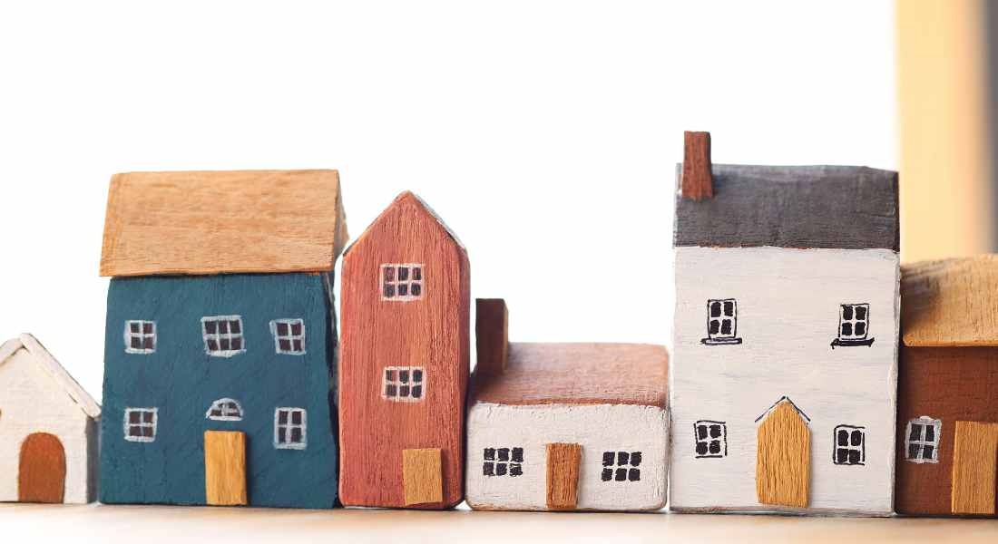 a row of houses with a white background