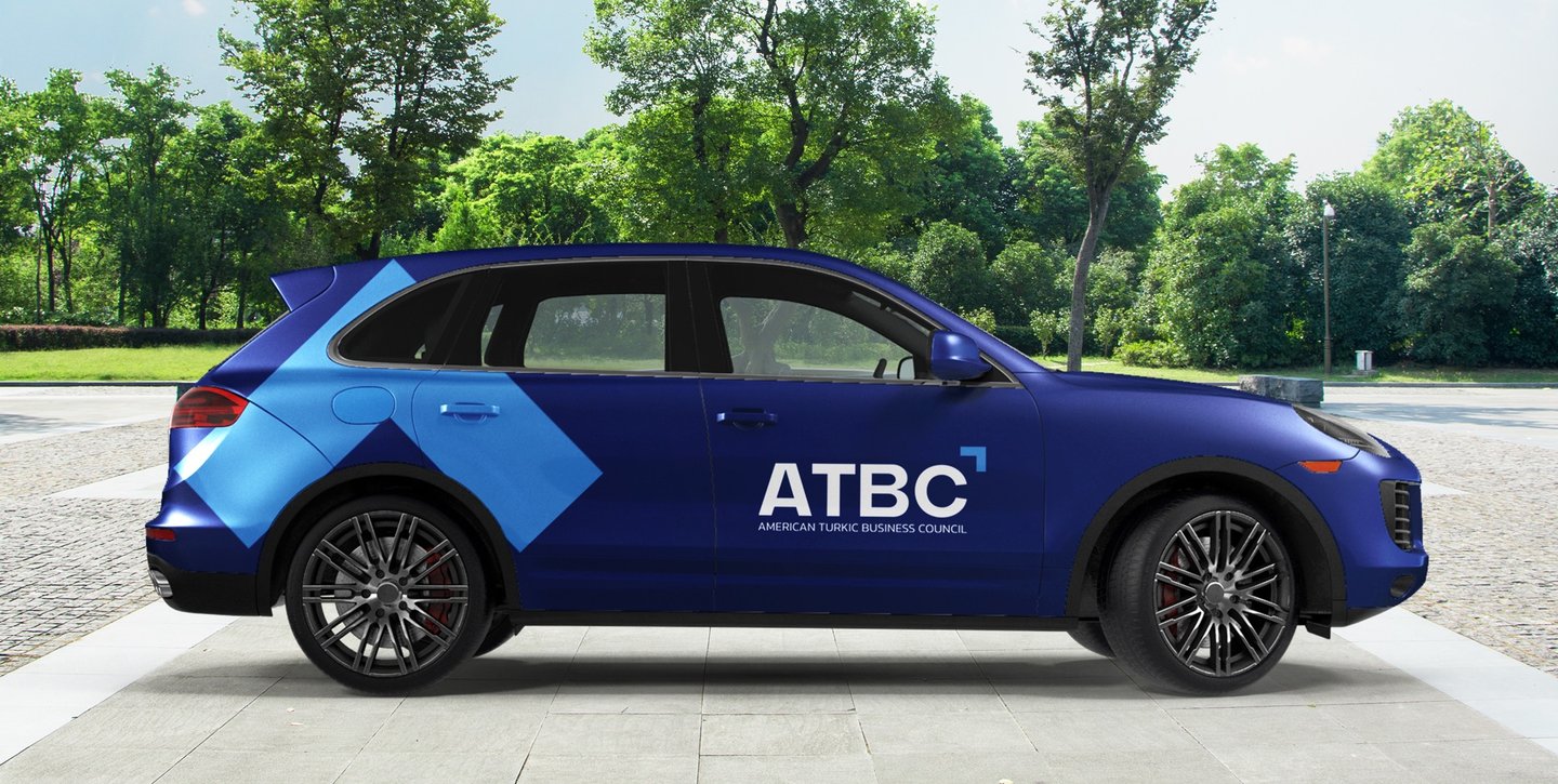 a blue car with a blue arrow on the side of it