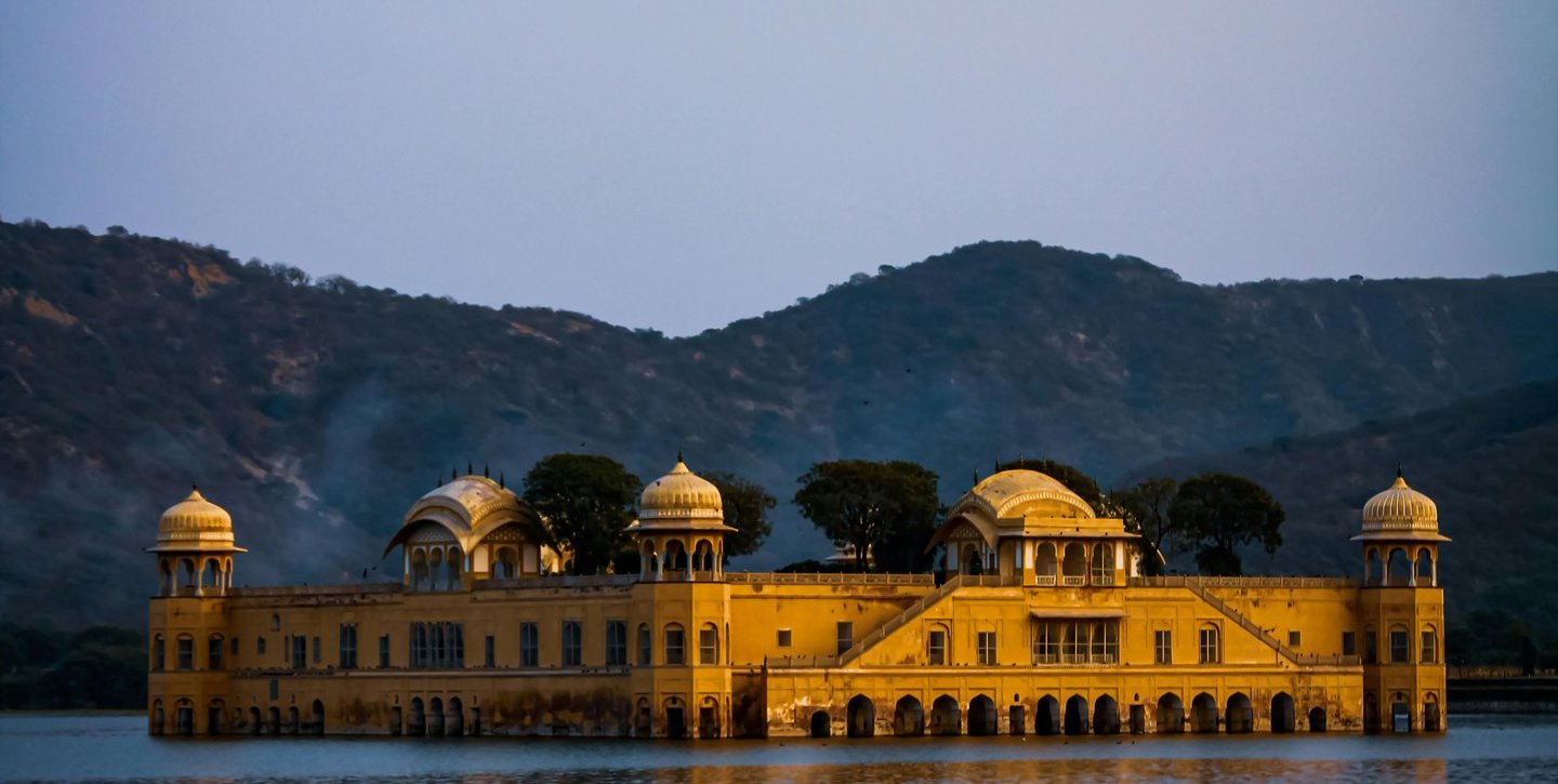 a large building with a large body of water