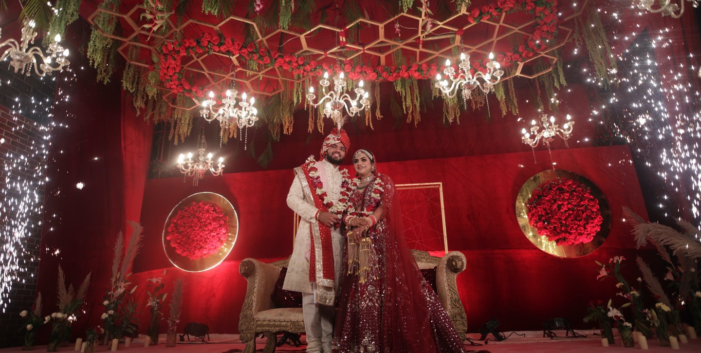 Ankit & Mehak pose during wedding ceremony in the hills of shimal at deventure in red hues 