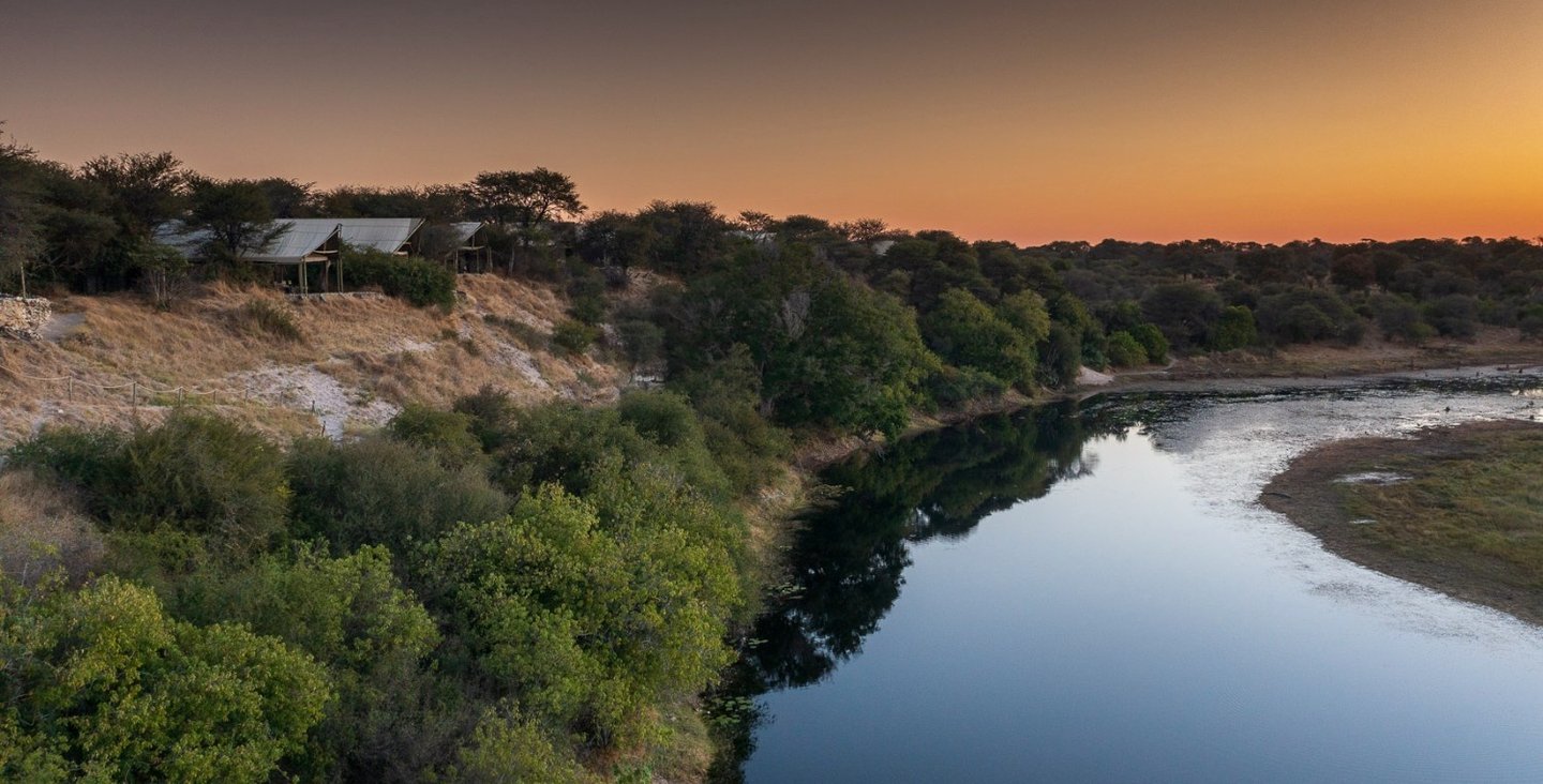 View over Meno-A-Kwena Tented Camp with the Boteti river Botswana