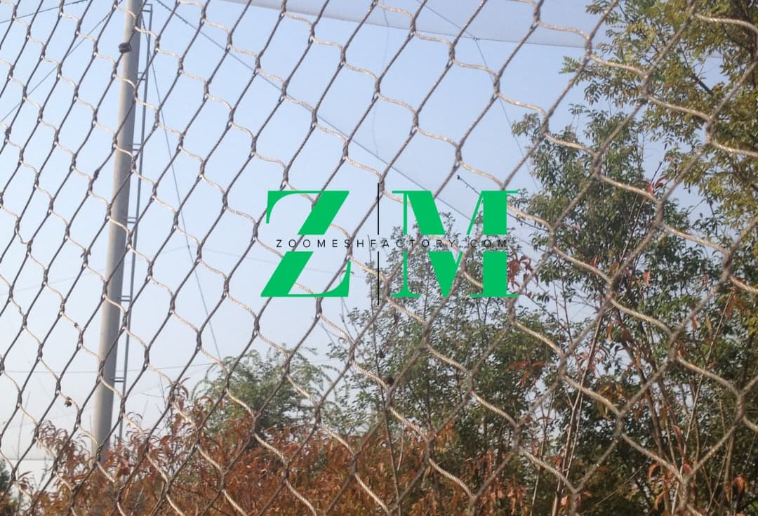 Durable stainless steel wire rope mesh used for zoo enclosure fencing and aviary netting.