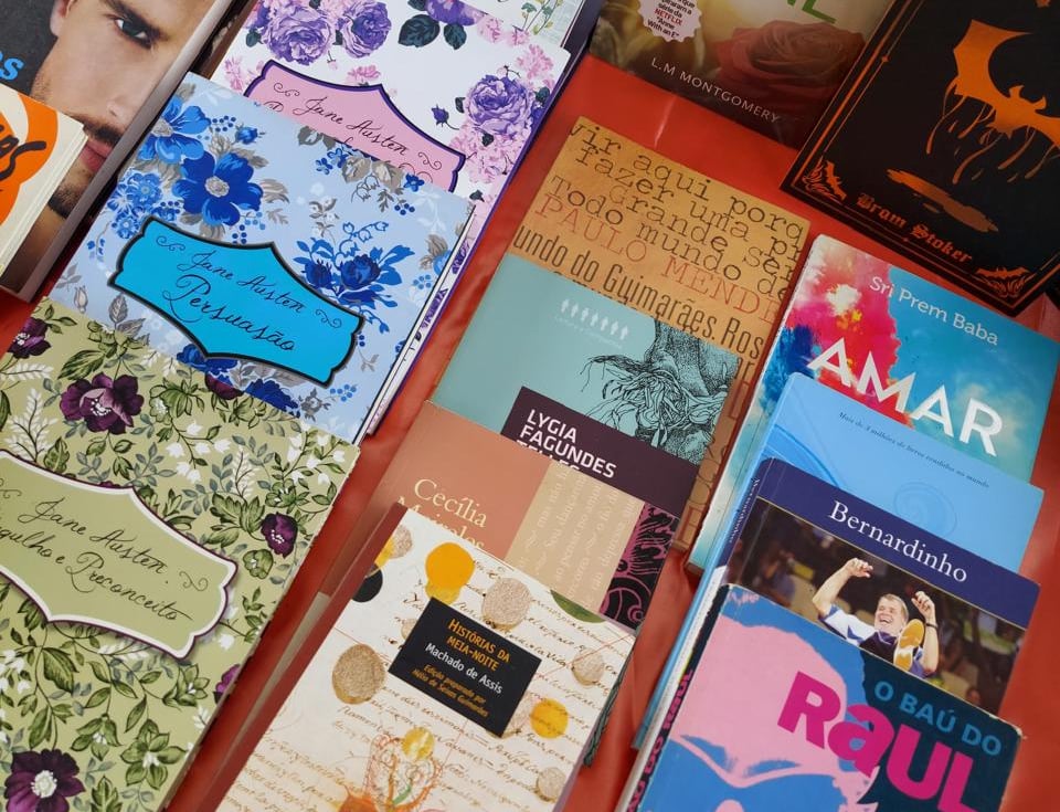 a table with a bunch of books and books