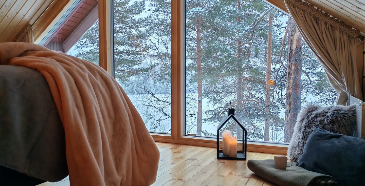 Majoitus järvi maisemalla