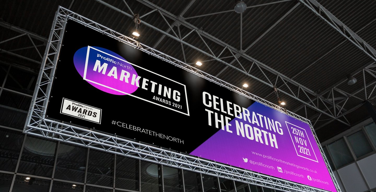 a billboard board with a large advertisement for Prolific North Marketing Awards