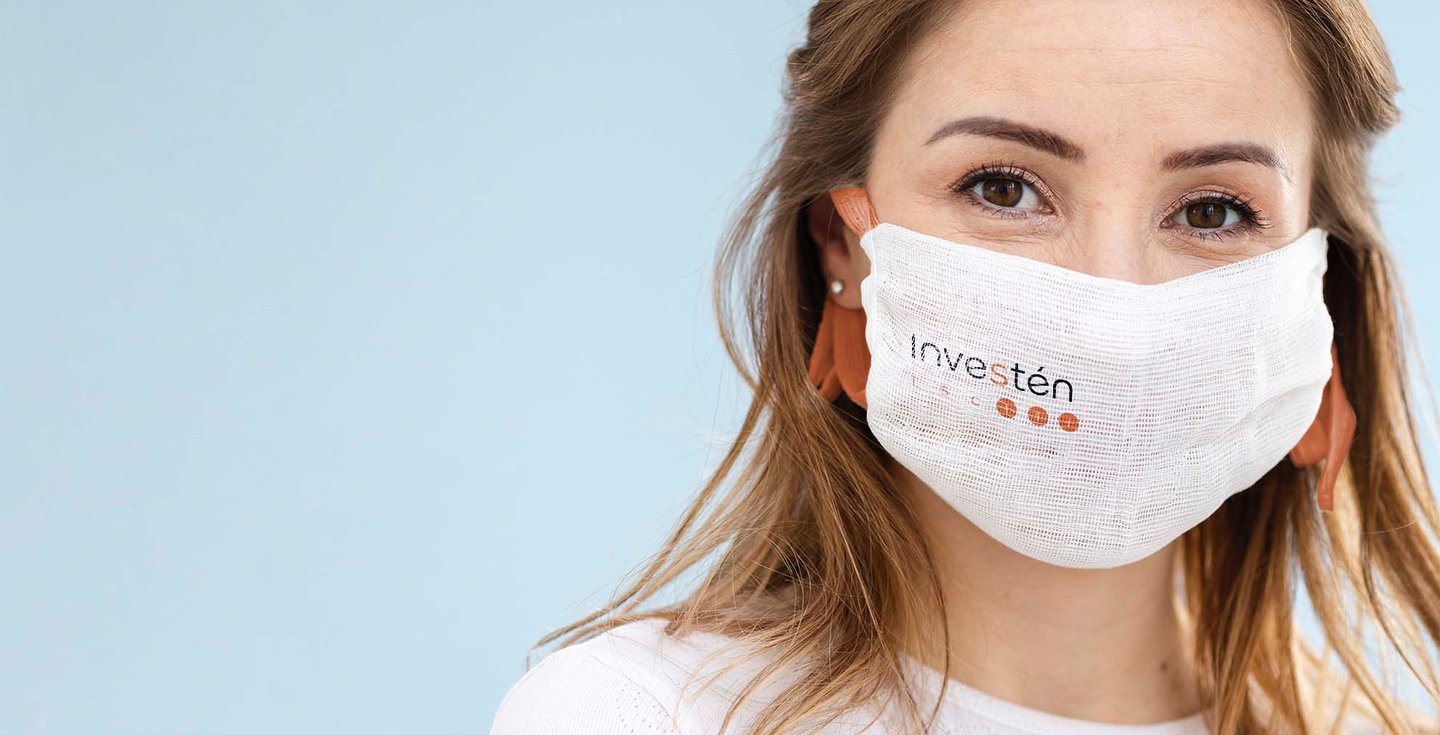 mujer con mascarilla de investen isciii