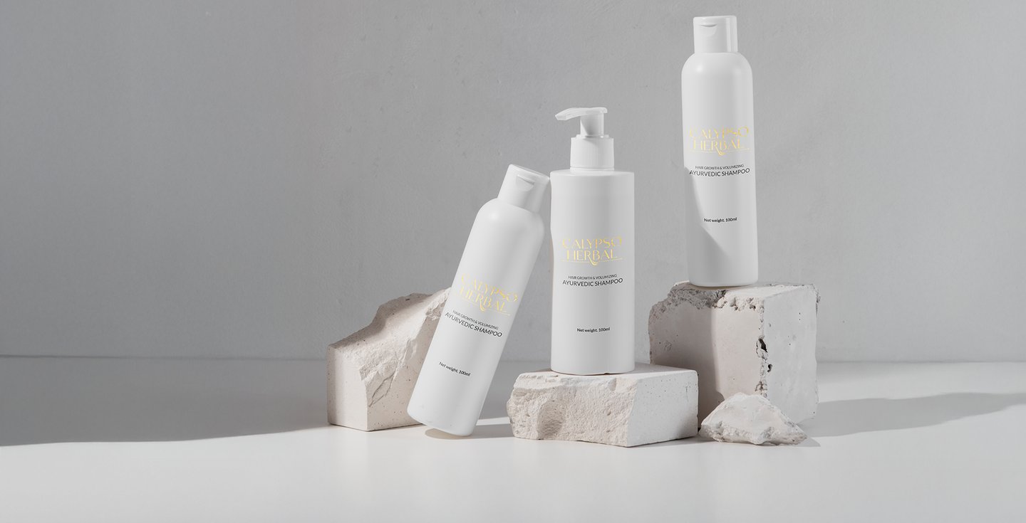 a group of white bottles of hair products