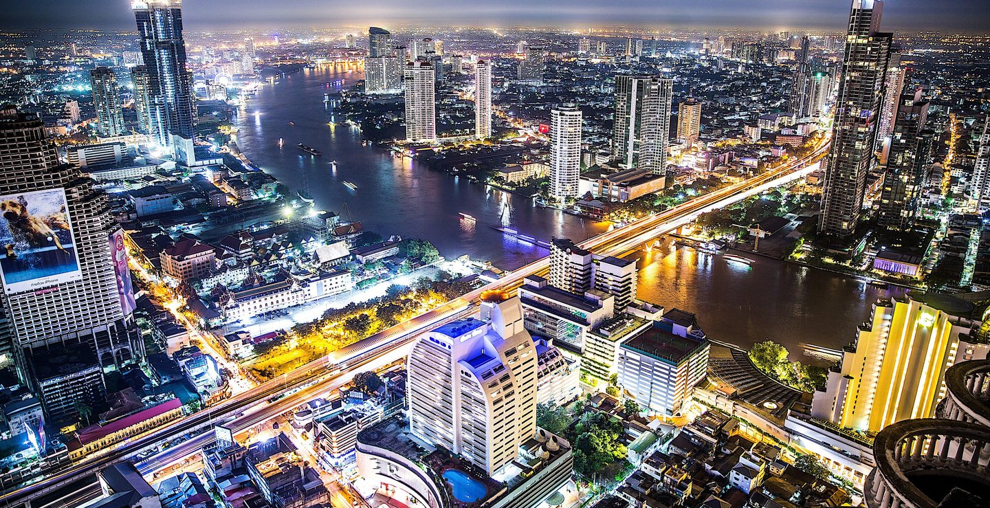 City and river view of Bangkok at night.
