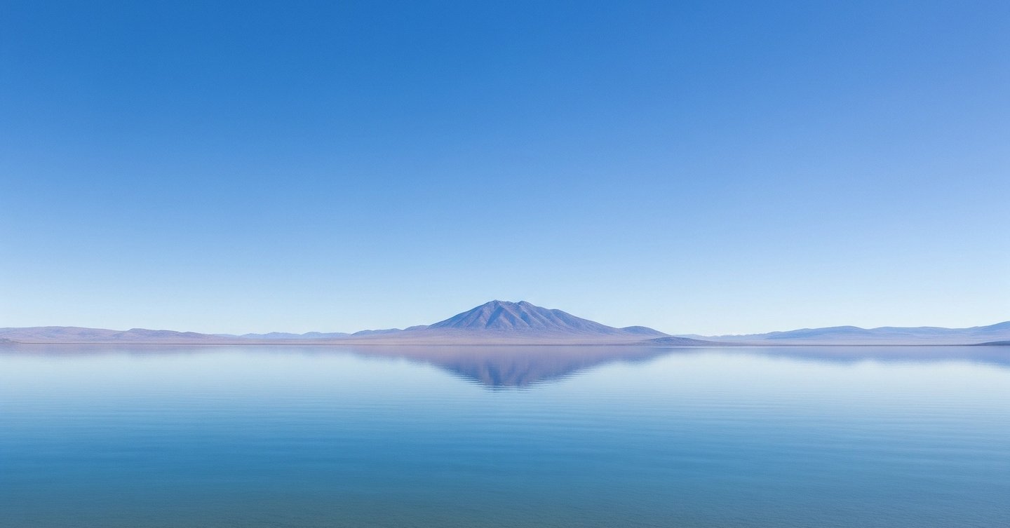 a lake with a mountain in the background