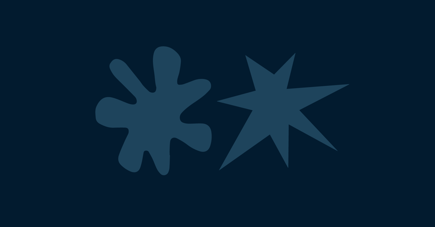 two people are standing in front of a dark blue background