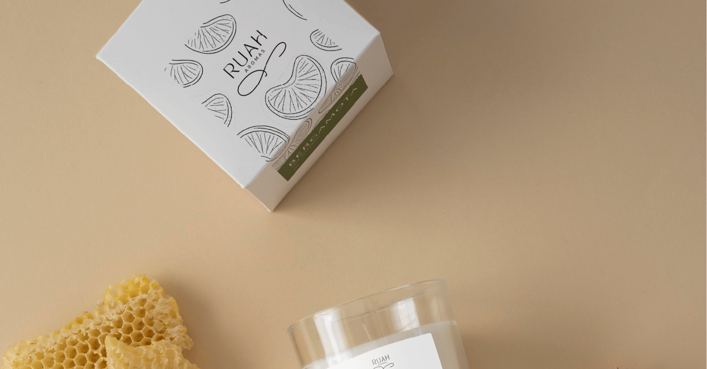 a candle with a candle and a candle on a table