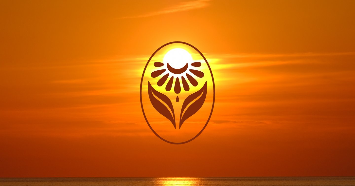 a sunset with a sun setting over the ocean