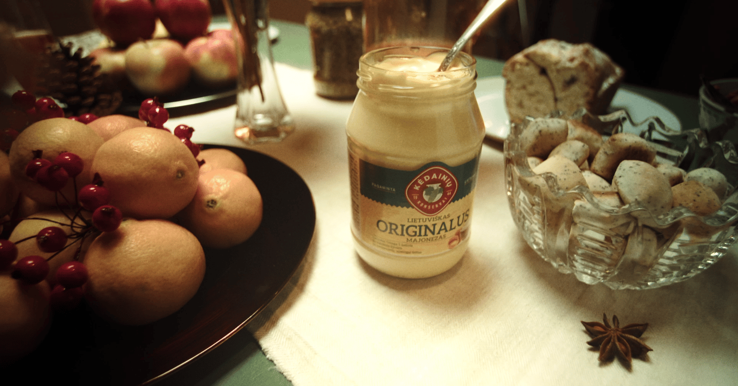 a jar of cream with a glass jar of milk