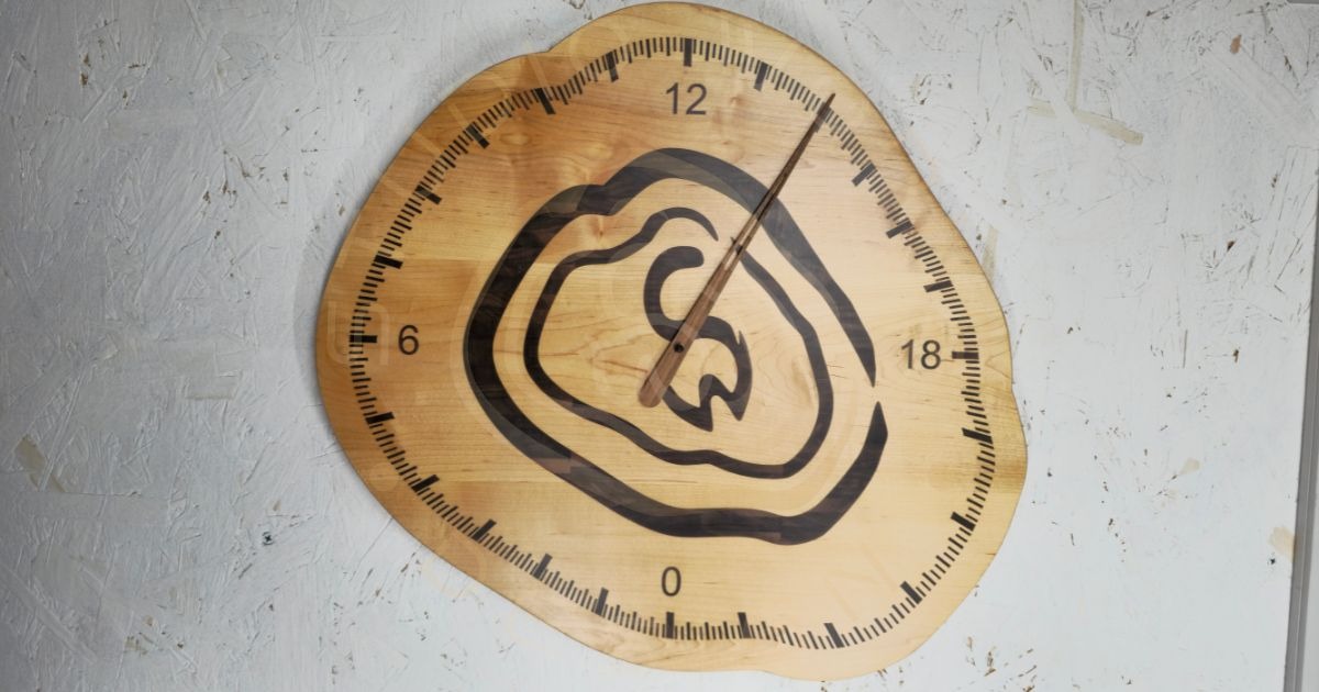 24-hour wood inlay clock in shape of logo